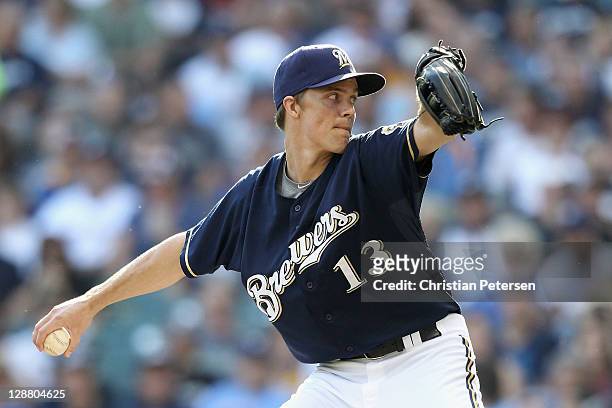Zack Greinke of the Milwaukee Brewers throws a pitch against the St. Louis Cardinals during Game one of the National League Championship Series at...