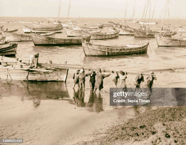 Jaffa quay in construction. 1934, Israel, Tel Aviv.