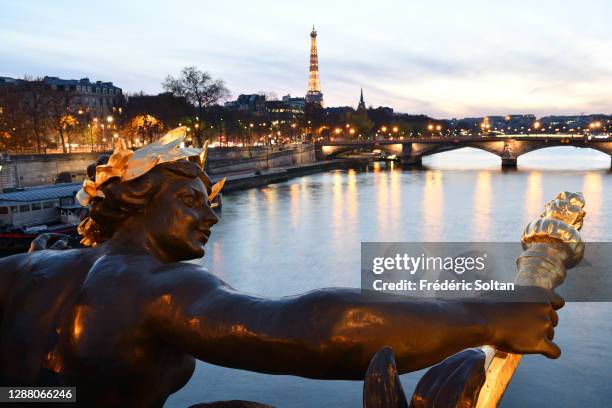 The bridge Alexandre III and the Eiffel Tower in the center of Paris on November 24, 2020 in Paris, France.