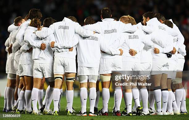 England players huddle during quarter final two of the 2011 IRB Rugby World Cup between England and France at Eden Park on October 8, 2011 in...