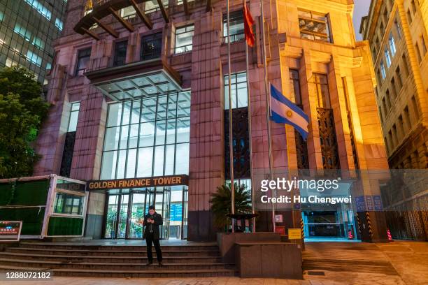 The Argentinian flag is flown at half mast outside the consulate of Argentina on November 27, 2020 in Shanghai, China. Football legend Diego Maradona...