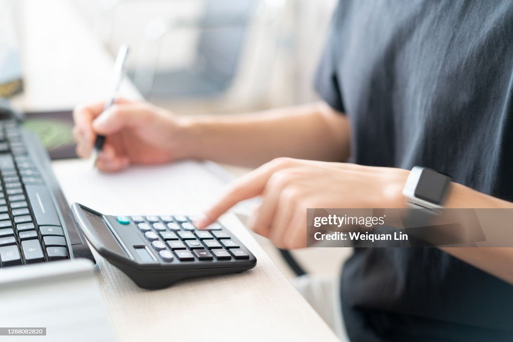 Calculator User People Using Calculator High-Res Stock Photo - Getty Images
