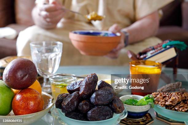 Traditional meal for iftar in time of Ramadan after the fast has been broken. Muslim eating. France.