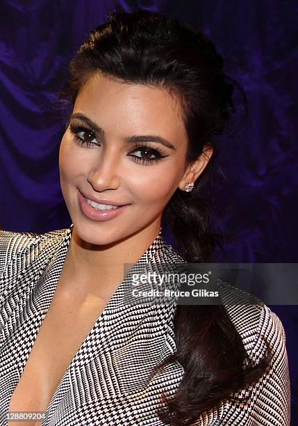 Kim Kardashian poses backstage at the hit play "Love, Loss and What I Wore" at The West Side Theater on October 9, 2011 in New York City.