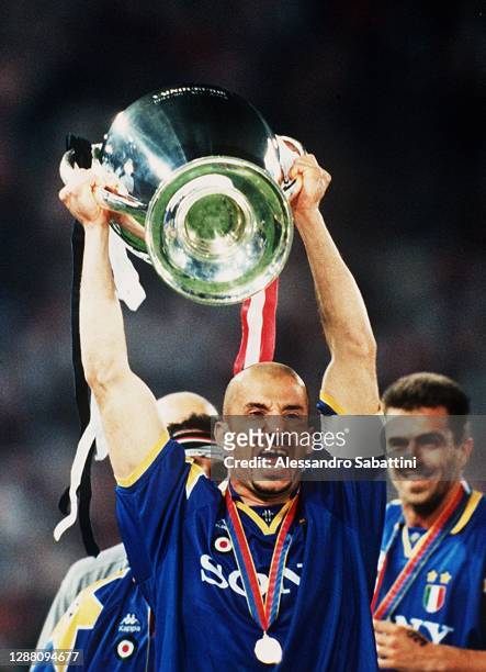 Gianluca Vialli of Juventus celebrates the victory with the trophy after the Final Champions League match between Ajax and Juventus at Stadio...