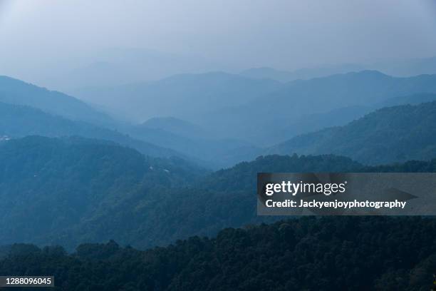 layer of mountains and mist in sunrise time at doi luang chiang dao, chiang mai province, thailand - generic location stock pictures, royalty-free photos & images