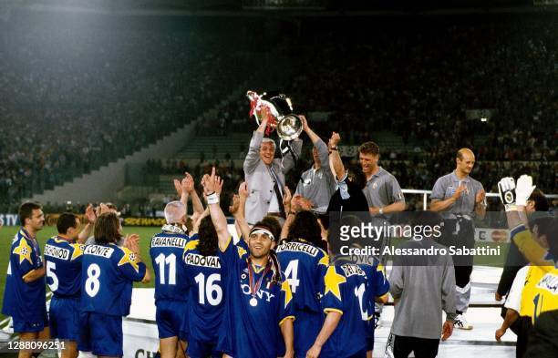 Marcello Lippi head coach of Juventus celebrates the victory with the trophy after the Final Champions League match between Ajax and Juventus at...