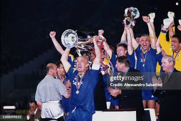 Gianluca Vialli of Juventus celebrates the victory with the trophy after the Final Champions League match between Ajax and Juventus at Stadio...