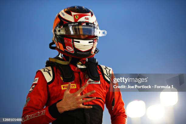 Pole position qualifier Callum Ilott of Great Britain and UNI-Virtuosi Racing celebrates in parc ferme during qualifying ahead of Round 11:Sakhir of...