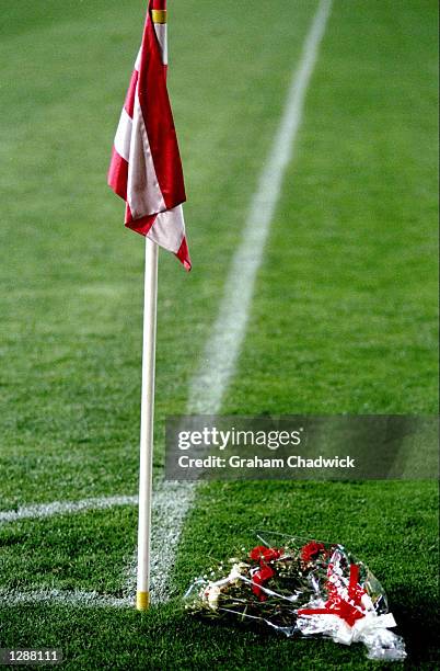 Flowers laid by the corner flag at the UEFA Cup quarter-final between Atletico Madrid and Roma at the Vicente Calderon Stadium in Madrid, Spain....