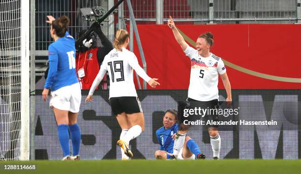 Marina Hegering of Germany celebrates with Klara Buhl after scoring her sides first goal during the UEFA Women's EURO 2022 qualifier match between...