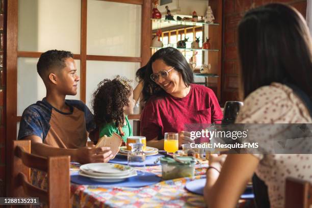 happy family having breakfast - mother's day breakfast stock pictures, royalty-free photos & images