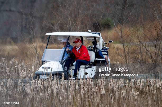 President Donald Trump golfs at Trump National Golf Club on November 27, 2020 in Sterling, Virginia. President Trump heads to Camp David for the...