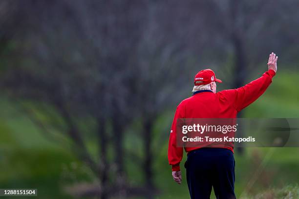 President Donald Trump walks to Marine One after golfing at Trump National Golf Club on November 27, 2020 in Sterling, Virginia. President Trump...