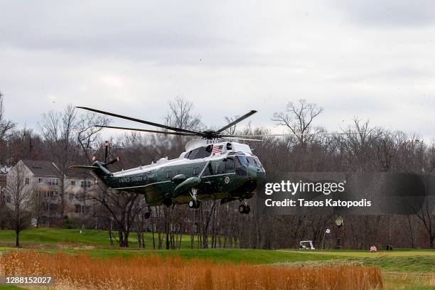 Marine One lands to pick up US President Donald Trump golfs at Trump National Golf Club on November 27, 2020 in Sterling, Virginia. President Trump...