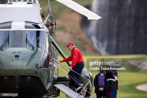 President Donald Trump boards Marine One after golfing at Trump National Golf Club on November 27, 2020 in Sterling, Virginia. President Trump heads...