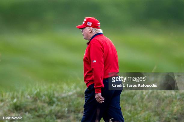 President Donald Trump walks to Marine One at Trump National Golf Club on November 27, 2020 in Sterling, Virginia. President Trump heads to Camp...