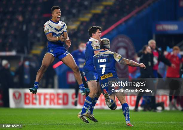 Regan Grace of St Helens leaps in the air to celebrate his side's victory during the Betfred Super League Grand Final between Wigan Warriors and St...