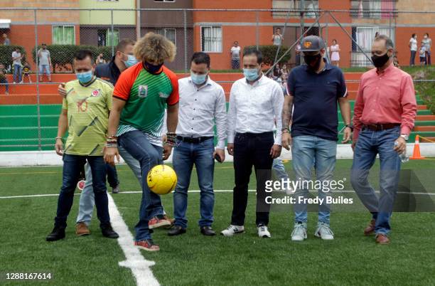 Carlos Valderrama known as 'El Pibe' former football player and captain of the Colombian national team plays the ball during the re-inauguration of...