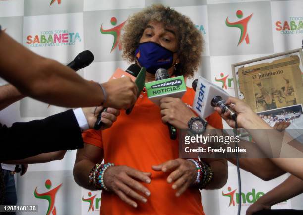 Carlos Valderrama known as 'El Pibe' former football player and captain of the Colombian national team speaks to the media during the re-inauguration...