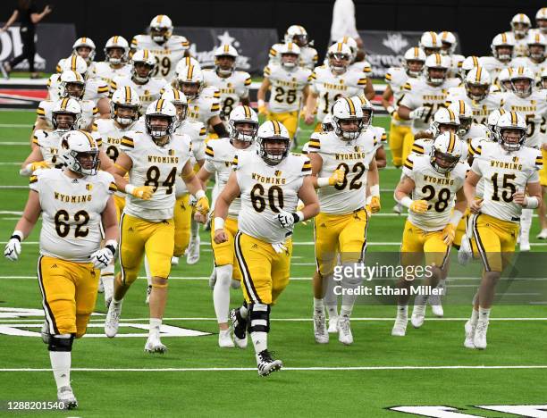 The Wyoming Cowboys take the field for their game against the UNLV Rebels at Allegiant Stadium on November 27, 2020 in Las Vegas, Nevada. The Cowboys...