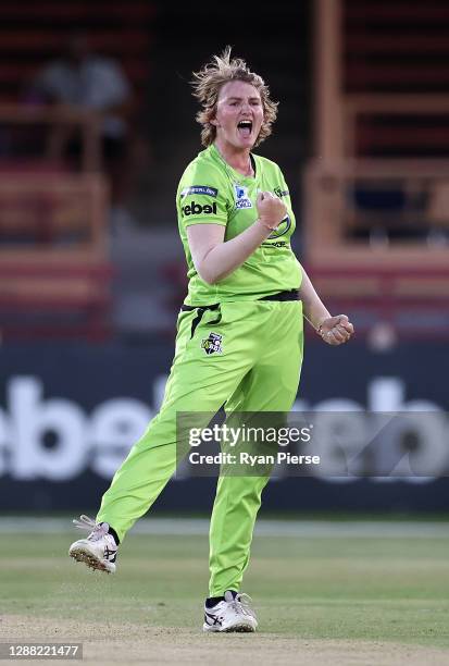 Sammy-Jo Johnson of the Thunder celebrates after taking the wicket of Mignon du Preez of the Stars during the Women's Big Bash League Final between...