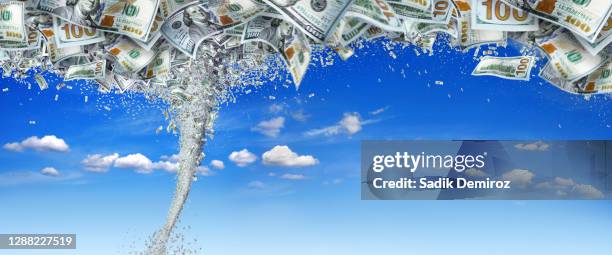 intense financial abundance concept of success - money tornado stock pictures, royalty-free photos & images