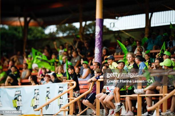 Fans react during the Women's Big Bash League Final between the Melbourne Stars and the Sydney Thunder at North Sydney Oval, on November 28 in...