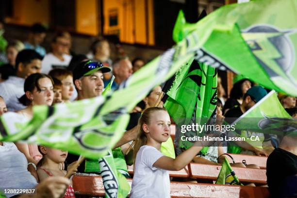 Fans react during the Women's Big Bash League Final between the Melbourne Stars and the Sydney Thunder at North Sydney Oval, on November 28 in...