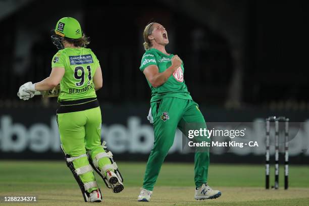 Katherine Brunt of the Stars celebrates taking the wicket of Tammy Beaumont of the Thunder during the Women's Big Bash League Final between the...