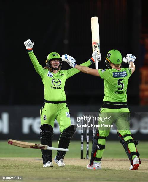 Rachael Haynes of the Thunder and Heather Knight of the Thunder celebrate victory during the Women's Big Bash League Final between the Melbourne...