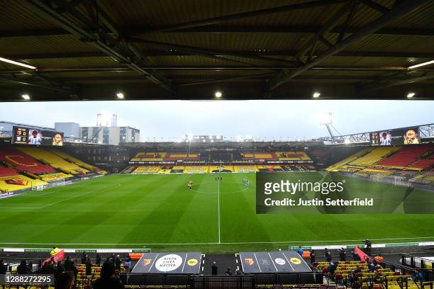 General view inside the stadium as Watford and Preston North End players take part in a minute of applause in honour of former footballer Diego...