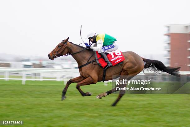Tom Scudamore riding Cloth Cap clear the last to win The Ladbrokes Trophy Chase at Newbury Racecourse on November 28, 2020 in Newbury, England....
