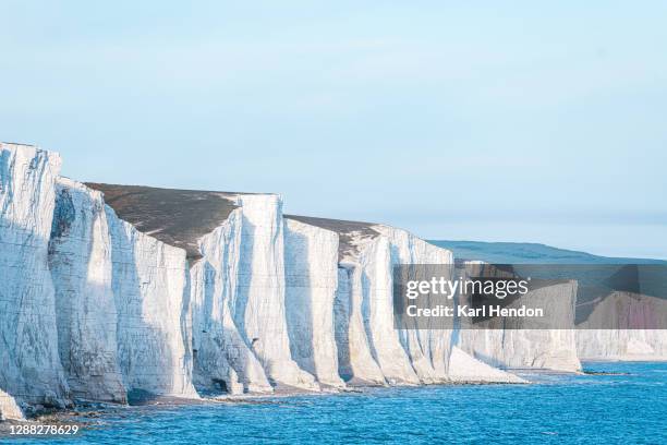 a daytime view of the seven sisters on the east sussex coast - stock photo - seven sisters cliffs stock pictures, royalty-free photos & images