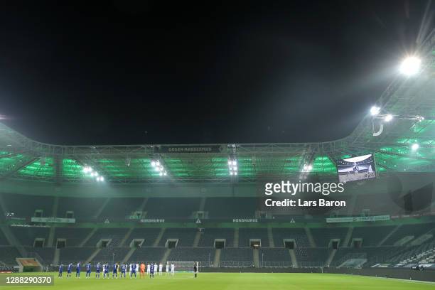 General view inside the stadium as FC Schalke 04 and Borussia Monchengladbach players observe a minutes silence for former footballer, Diego...
