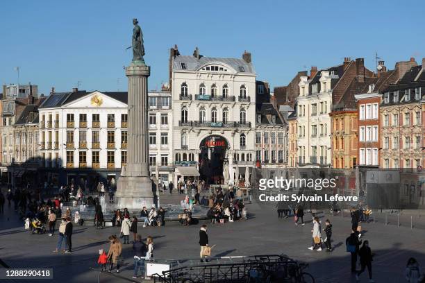 Consumers take advantage of the reopening of "Non-essential" shops after lockdown in the city centre on November 28, 2020 in Lille, France.