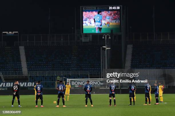 Players and Officials observe a minute of silence prior to kick off in memory of Diego Maradona during the Serie A match between Atalanta BC and...