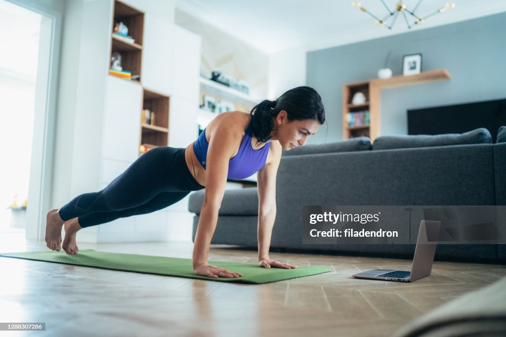 Working Out Example Woman Working Out At Home High-Res Stock Photo - Getty Images