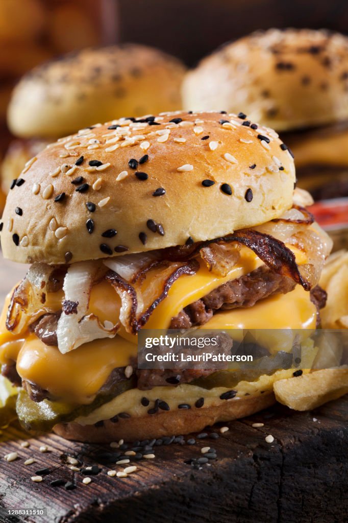 Double Cheese Burger Sliders with Fried Onions, Pickles on a Brioche Sesame Seed Bun