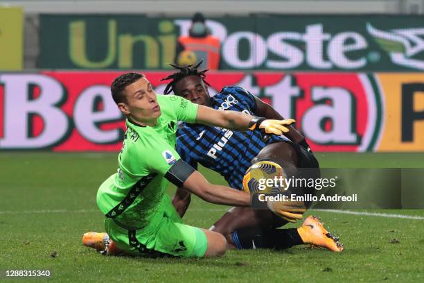 Marco Silvestri of Hellas Verona F.C. Saves a shot from Duvan Zapata of Atalanta B.C. During the Serie A match between Atalanta BC and Hellas Verona...