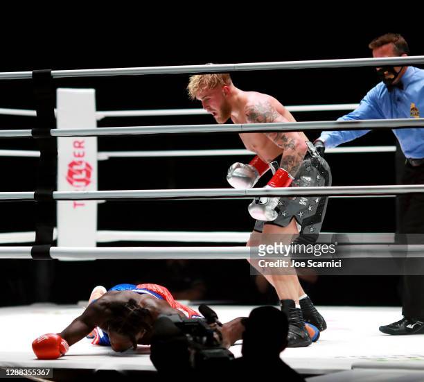 Jake Paul reacts over his knockout victory against Nate Robinson in the second round during Mike Tyson vs Roy Jones Jr. Presented by Triller at...