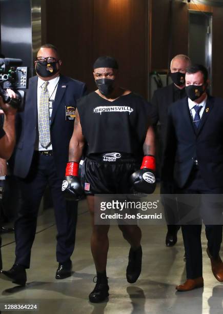 Mike Tyson walks towards the ring during Mike Tyson vs Roy Jones Jr. Presented by Triller at Staples Center on November 28, 2020 in Los Angeles,...