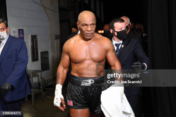 Mike Tyson exits the ring after receiving a split draw against Roy Jones Jr. During Mike Tyson vs Roy Jones Jr. Presented by Triller at Staples...