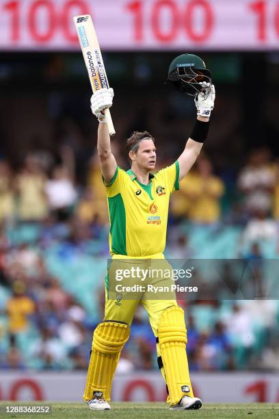 Steve Smith of Australia celebrates making 100 runs during game two of the One Day International series between Australia and India at Sydney Cricket...