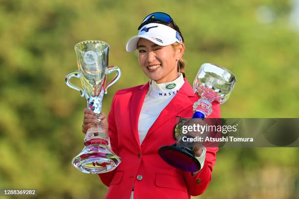 Erika Hara of Japan winks after winning the tournament following the final round of the JLPGA Tour Championship Ricoh Cup at the Miyazaki Country...