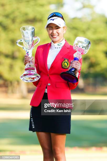 Erika Hara of Japan winks after winning the tournament following the final round of the JLPGA Tour Championship Ricoh Cup at the Miyazaki Country...