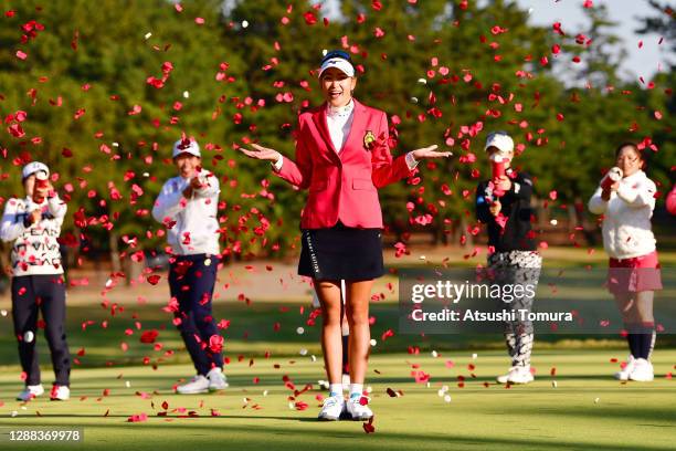 Winner Erika Hara of Japan is congratulated by fellow golfers after the final round of the JLPGA Tour Championship Ricoh Cup at the Miyazaki Country...