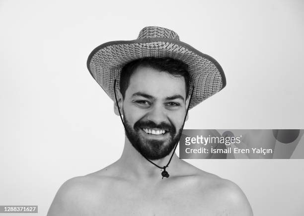 smiling male model in hat - catwalk male stock pictures, royalty-free photos & images