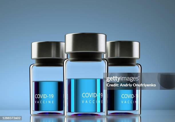 covid-19 vaccine - dosing stock pictures, royalty-free photos & images