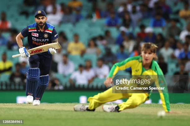 Virat Kohli of India plays a shot past Adam Zampa of Australia during game two of the One Day International series between Australia and India at...